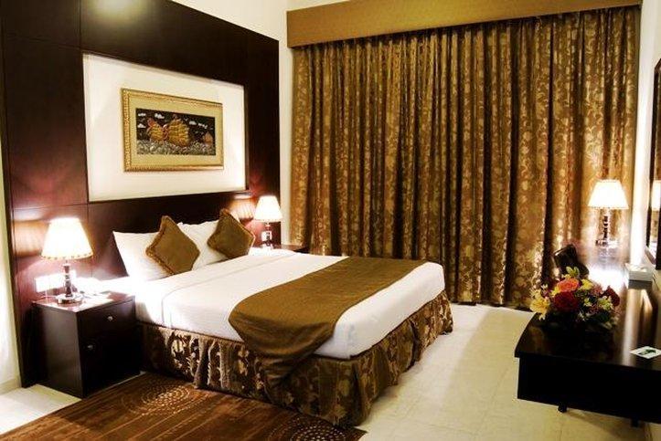 Arabian Dreams Hotel Apartments Дубай Стая снимка