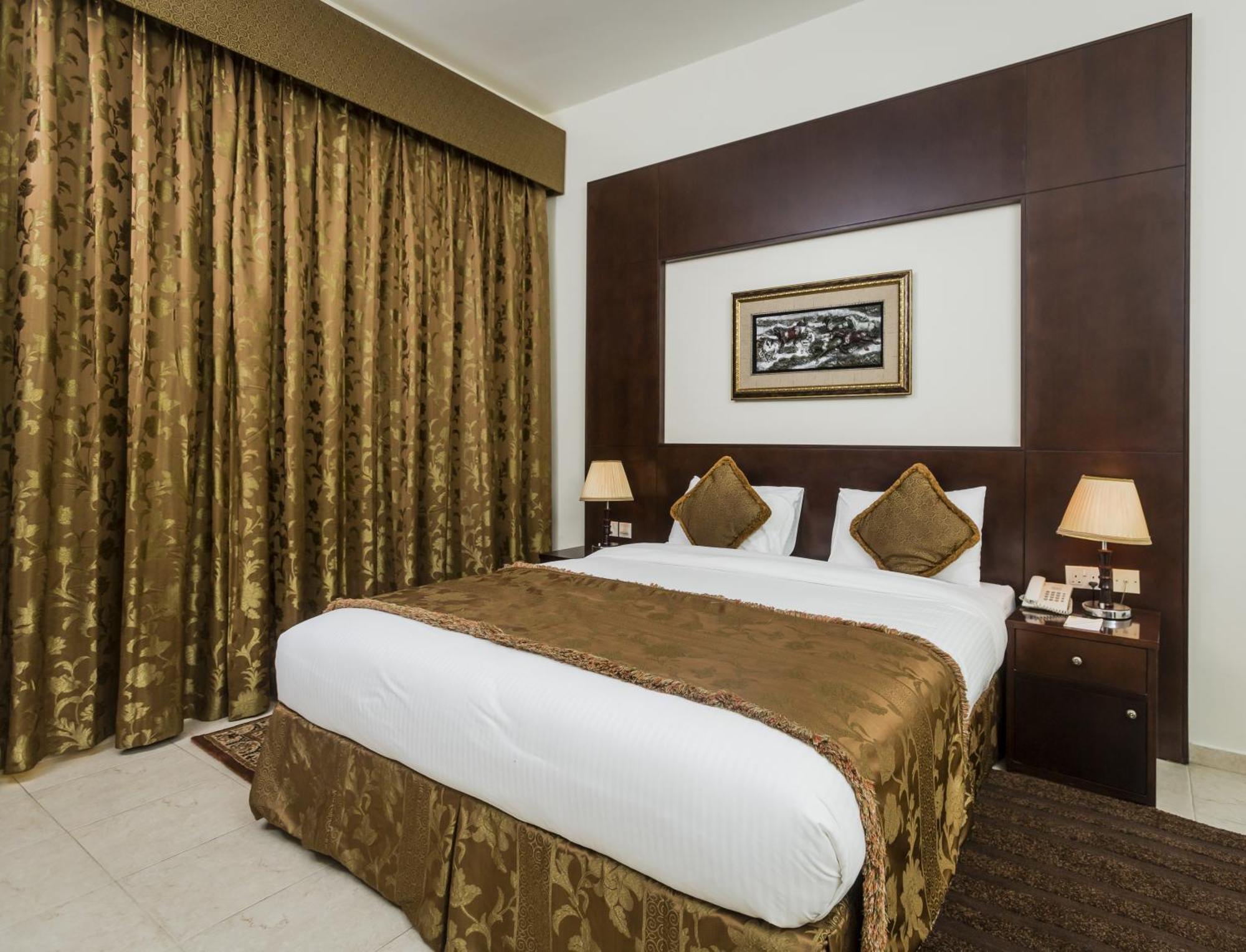 Arabian Dreams Hotel Apartments Дубай Стая снимка